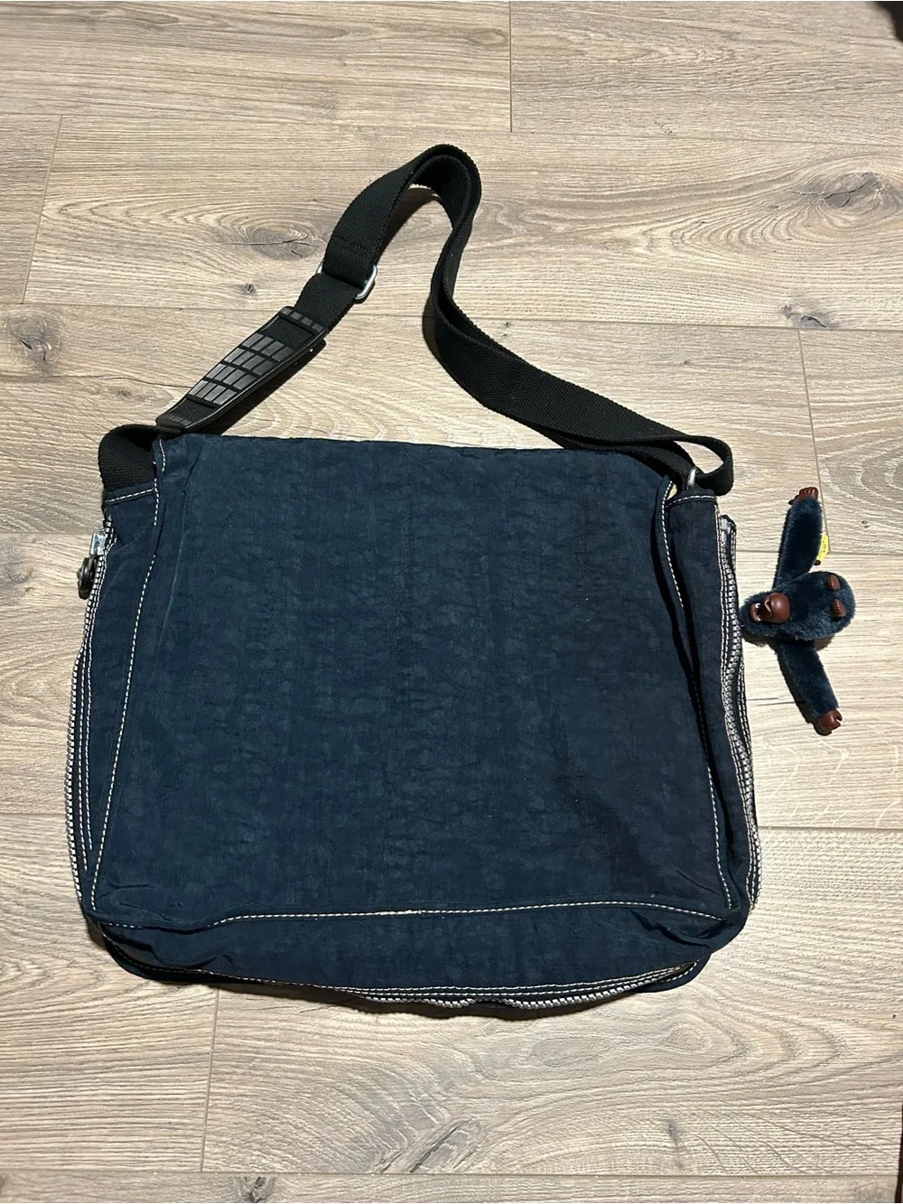 Kipling Dark Blue Expandable Messenger Bag with Monkey Charm